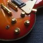 Custom Grand Solid Mahogany Body Electric Guitar in Cherryburst and with Gold Hardware